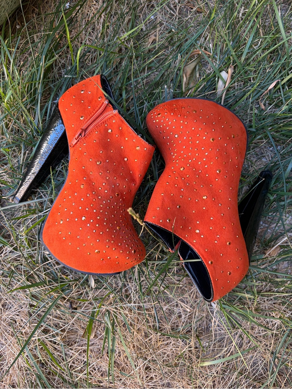 Women's Orange Studded synthetic Suede High Heel Booties.